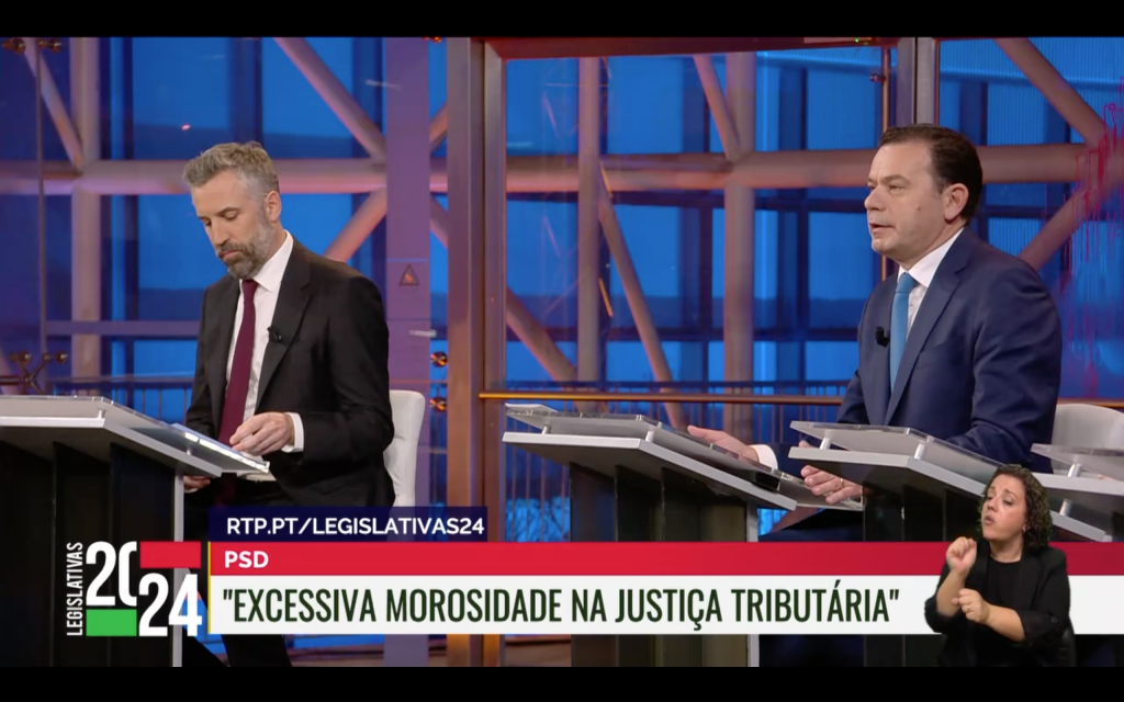 Pedro Nuno Santos e Luís Montenegro no último debate para as eleições à Assembleia da República de 2024, com foco no tema da "morosidade" da justiça